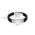 A black silicone bracelet with a silver metal clasp and adjustable size features. Dimensions and design details are included.