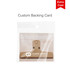 A plastic magnetic clip in a beige colour, packaged with a custom backing card and featuring a logo.