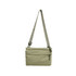 A lightweight crossbody bag in a muted beige colour with an adjustable strap and a zippered front pocket.