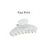 A transparent acetate hair clip in white with a glossy finish and an elegant design. Features a logo on the side.