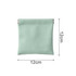 A small, mint green cosmetic bag with a zip closure, measuring 12 cm by 12 cm. It features a branding logo.