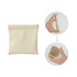 A small, cream-coloured pocket cosmetic bag with a zipper, shown from the front and being held by a hand.
