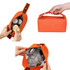 An orange portable canvas cosmetic bag with a zipper, featuring various containers inside and a handle for easy carry.