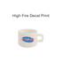 A ceramic mug in white featuring a vibrant design, including the phrase "Self Love," with a sturdy handle.