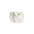 A pair of oval white velvet jewelry pouches with gold snap closures and a logo on one.