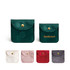 A square velvet jewellery pouch available in green, white, pink, red, and grey, featuring a logo.