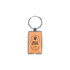 A metal keyring with a rectangular orange epoxy tag featuring an acorn design and branding.