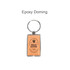 An orange NFC epoxy square tag attached to a metal keyring, featuring a logo.