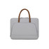 A grey laptop bag with a zippered outer pocket and brown PU handles, featuring a simple and sleek design.