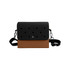 A black and brown EVA Holes briefcase featuring a sleek design with a strap and multiple holes on the front.