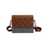 A briefcase with a brown top section featuring holes and a grey bottom, equipped with a shoulder strap.