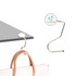 A round, curved desk hook in silver, featuring a circular logo, with a smooth, sleek design for hanging items.