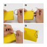 Custom yellow index cards with a metal ring, being assembled by hands in four steps.