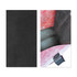 A custom sublimation tote bag featuring a textured black exterior and a pink interior with a logo.