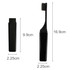 A foldable travel toothbrush in black, displayed in both folded and extended positions, with dimensions noted.