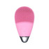 A pink silicone facial cleansing brush with textured surface and control buttons, featuring a metallic base.