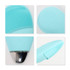 A silicone facial cleansing brush in light blue, featuring textured surfaces and a sleek metallic base.