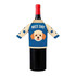A drink bottle adorned with a blue and cream wine bottle sleeve featuring a dog motif and star patterns.