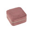 A square, soft, pink velvet jewellery organiser with a zip closure. It has a smooth, textured surface.