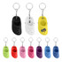 Miniature clog shoe keyrings in various colours: black, white, yellow, green, pink, purple, and blue, with a logo on one.