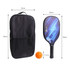 A wooden pickleball paddle with a blue design, an orange ball, and a black carrying bag.