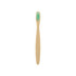 A small bamboo toothbrush with a natural wood handle and green bristles, featuring a logo.