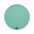 A round makeup mirror in mint green with a textured surface and a silver snap button.