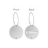 A round silver wire cable luggage tag with a smooth front and a back featuring a name slot.
