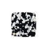 A square acetate vanity mirror featuring a black and white speckled design with a small gold accent.