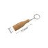 A drink bottle-shaped cork keyring in a natural cork colour with a silver keychain attachment.