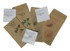 A collection of seed envelopes in various designs and earthy tones, featuring floral and vegetable illustrations.