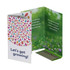 A folded greeting card featuring a colourful polka dot design, containing assorted seeds for planting.