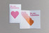 A medium seed paper greeting card in white and pink, featuring a heart design and 'Be my Valentine' text.