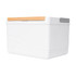 A white cooler box with a wood-accented lid and a smooth design. It features a logo on one side.