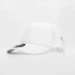 A white cap with a mesh back and a logo on the front, positioned at an angle.
