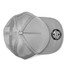 A grey cap with a rounded top and mesh back, featuring a circular logo on the front panel.