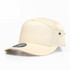 A cream-coloured cap featuring a branded logo and a structured design.