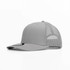 A grey trucker cap featuring a solid front and mesh back, with an attached logo.