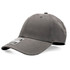 A cap in a grey colour featuring a logo on the front. It has a classic design with a curved brim.