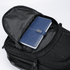 A black Fitzroy backpack with a blue notebook inside the main compartment and a textured finish.