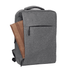 A grey backpack featuring a front pocket and a brown item partially visible inside. It has a logo on the front.