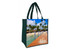 A green tote bag featuring a scenic beach design with palm trees and a wooden boardwalk, including a logo.