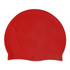 A red silicone swimming cap with a smooth surface and a rounded shape. It includes a logo.