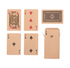 Recycled paper playing cards in earthy tones, featuring various card designs and a matching tuck box.