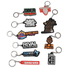 A collection of custom moulded PVC keyrings in various colours, featuring multiple designs and logos.