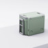 A green cooler box with a folding handle, featuring a textured lid and a compact design for outdoor use.
