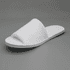 White open-toe hotel slippers with a soft fabric upper and flat rubber sole, featuring a simple design.