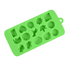 A green silicone ice tray featuring various custom moulds in different shapes, including stars, hearts, and animals.