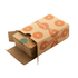 A deck of custom playing cards in a cardboard box featuring a fruit design, predominantly orange and green.