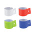 A collection of four wristbands in white, red, green, and blue, with a cut-out design and a hole for fastening.